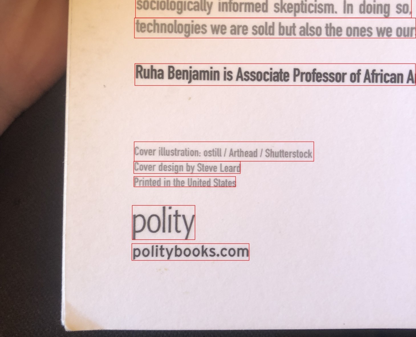 Image of back of book with red bounding boxes around detected text